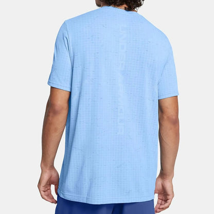 Person wearing a light blue t-shirt on a white background