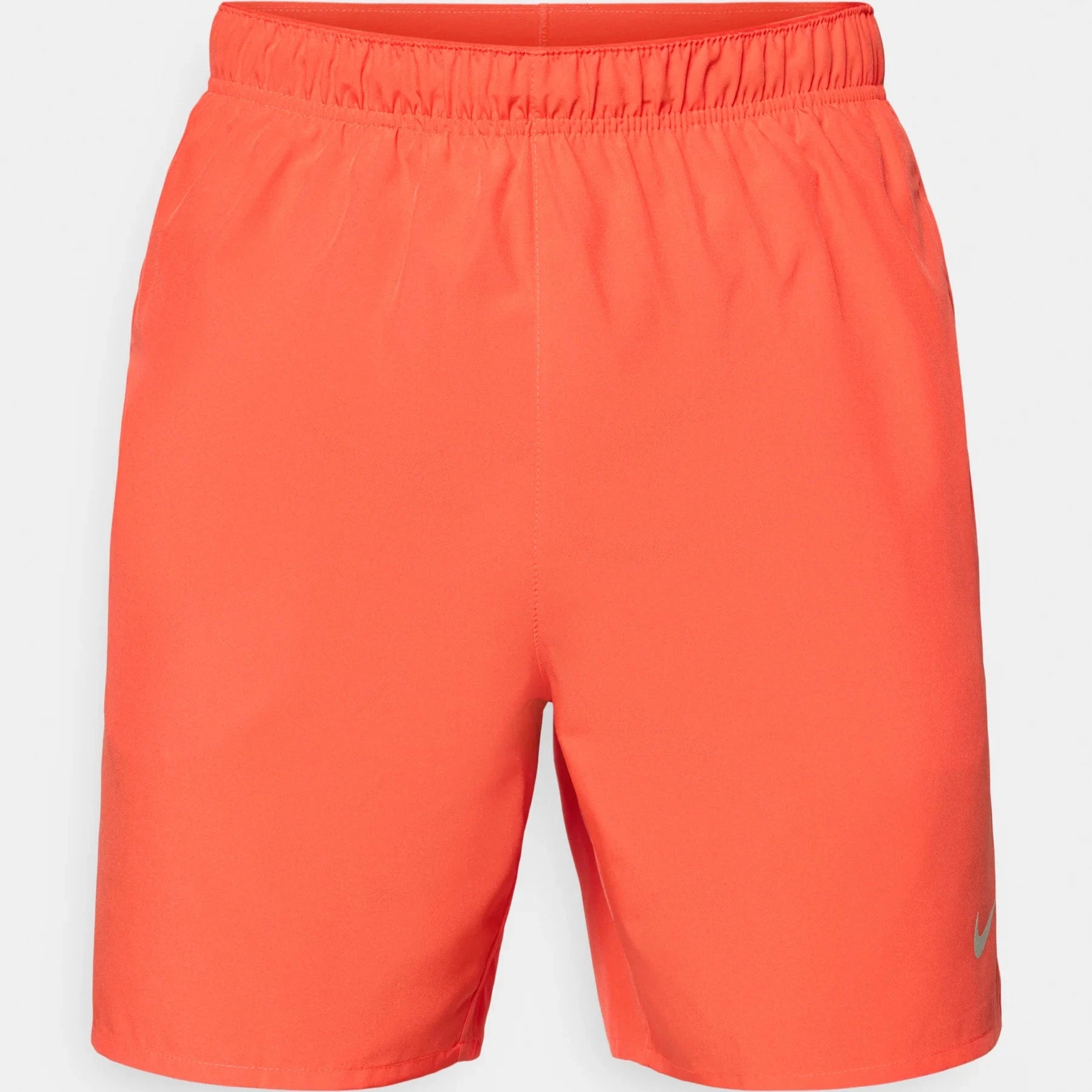 Orange shorts on a light gray background