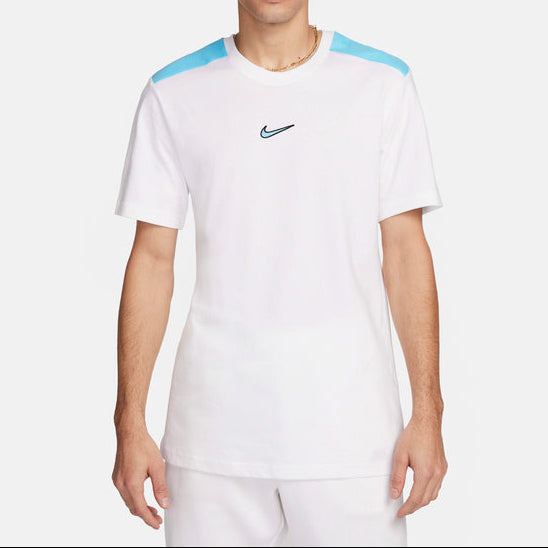 Person wearing a white Nike sports outfit on a white background