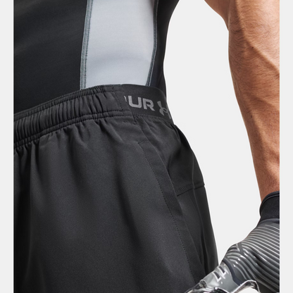 Close-up of black cycling bib shorts with a blurred background