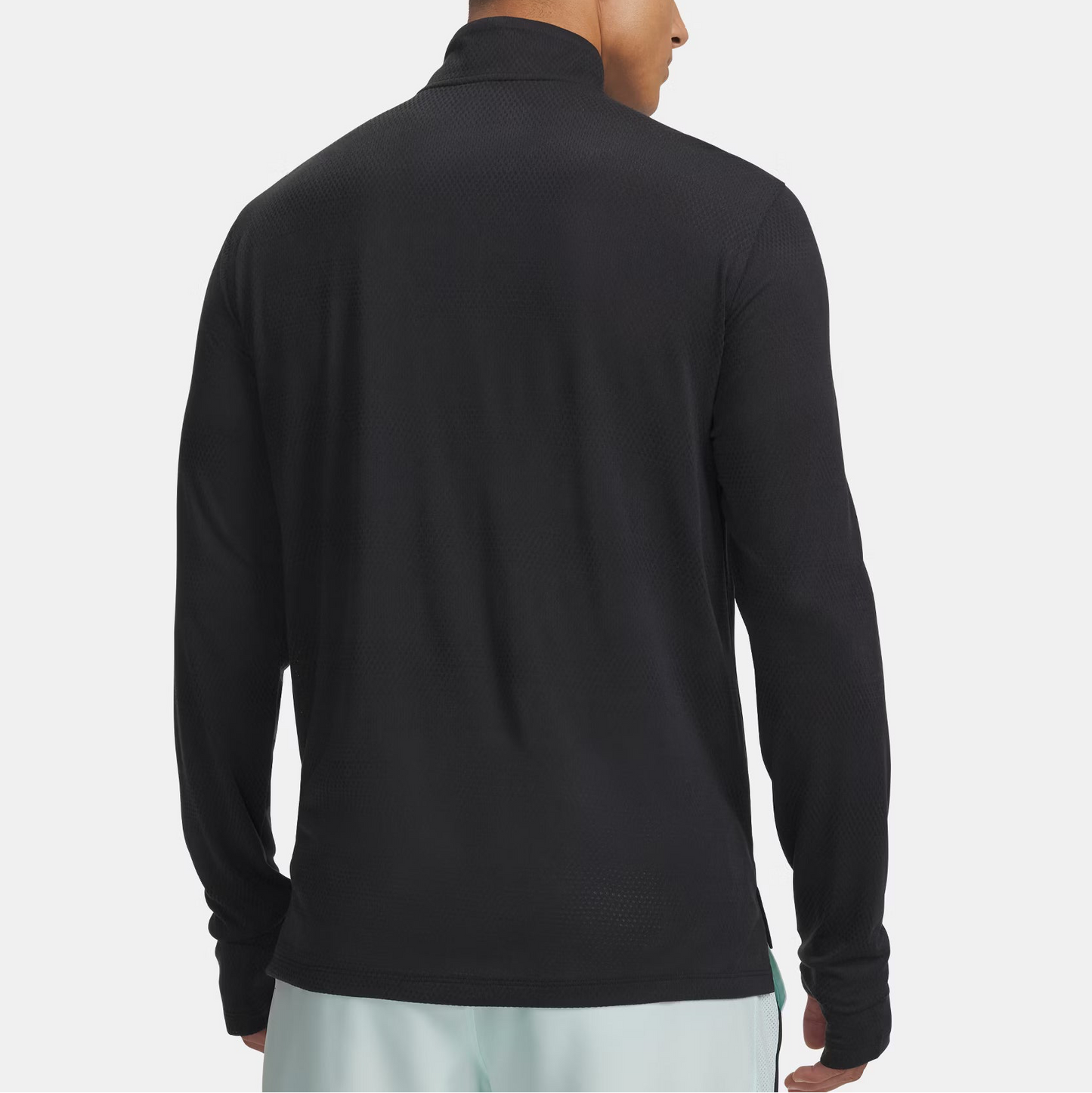Person wearing a black long-sleeve shirt on a white background