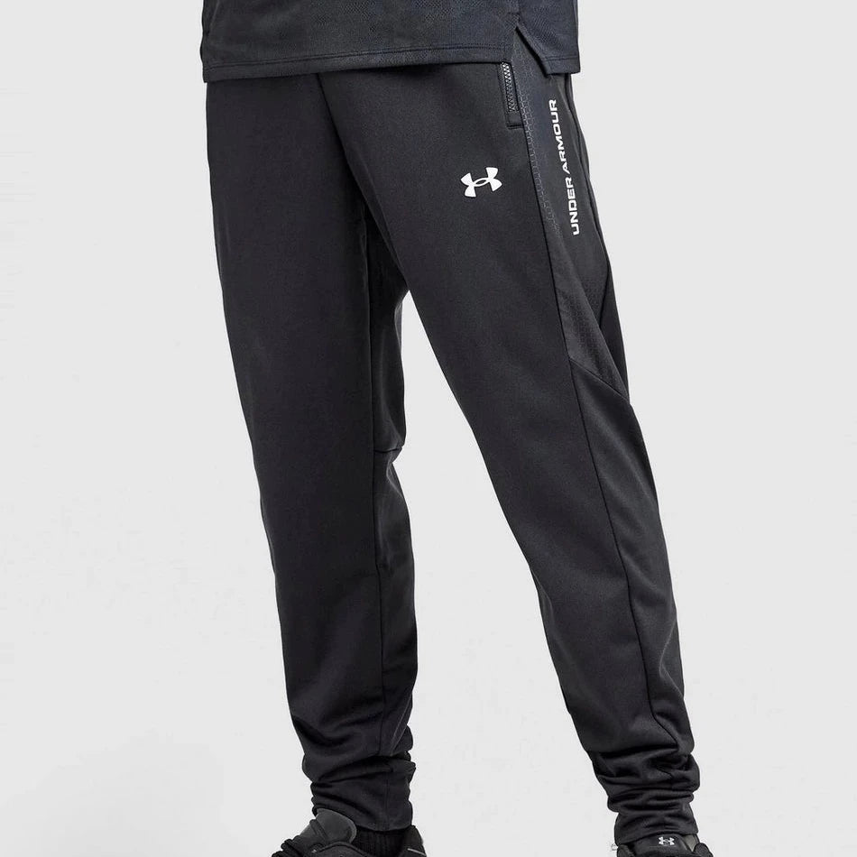 Black athletic pants with Under Armour logo on a white background