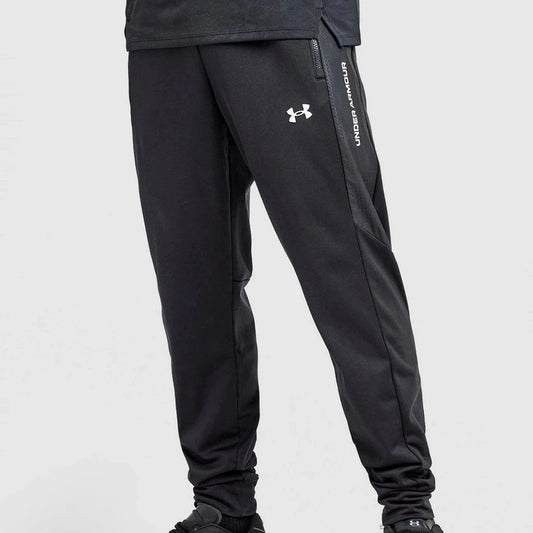 Black athletic pants with Under Armour logo on a white background